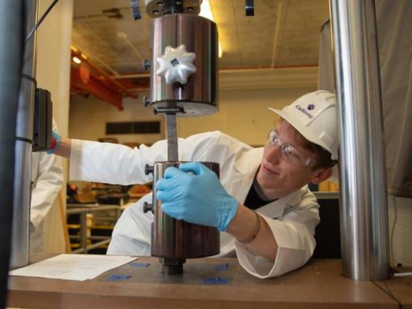 Student in lab utilizing recycled human hair to help repair bridges and buildings across Kentucky and beyond.